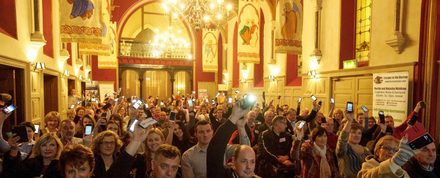 Members of the audience hold up their smart phones at the official launch of #DigitalClare in the Temple Gate Hotel, Ennis. Photograph by John Kelly.